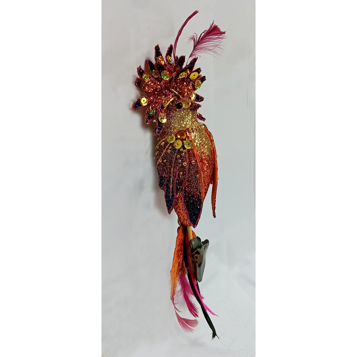 9-inch cockatiel clip-on ornament with orange and gold glitter, sequins, and pink feathers.