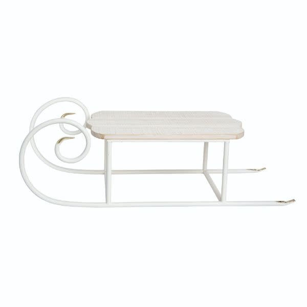 Metal sled decoration with gold tips measuring 30 inches long.