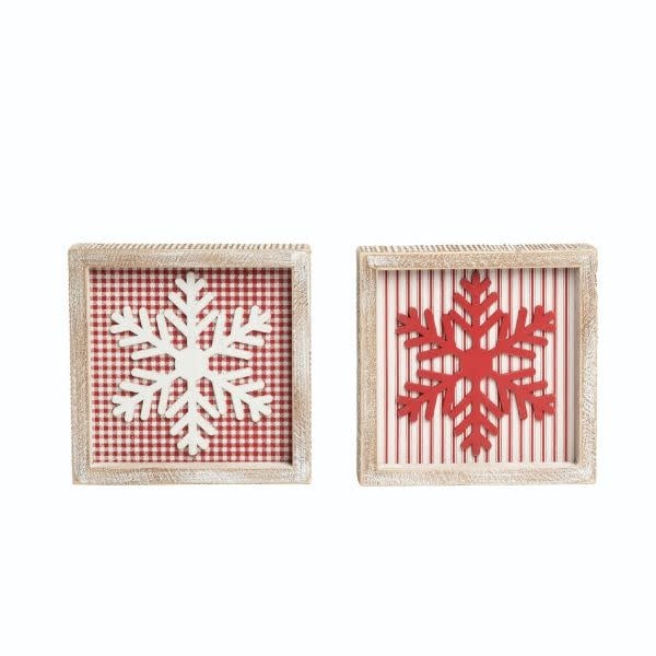 Wood dimensional snowflake decor with a natural finish.