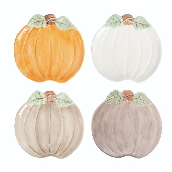 Dol glazed ceramic plate shaped like a pumpkin with orange glaze.