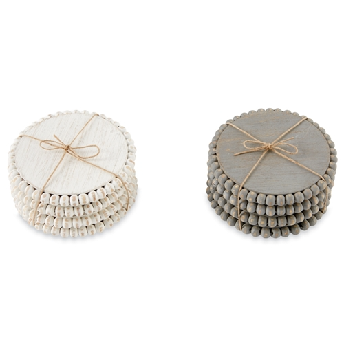 Beaded wood coaster with natural grain finish and intricate dark beadwork pattern.