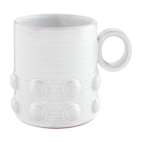 Glazed terracotta ceramic mug with white beaded decorative pieces on the bottom rim.
