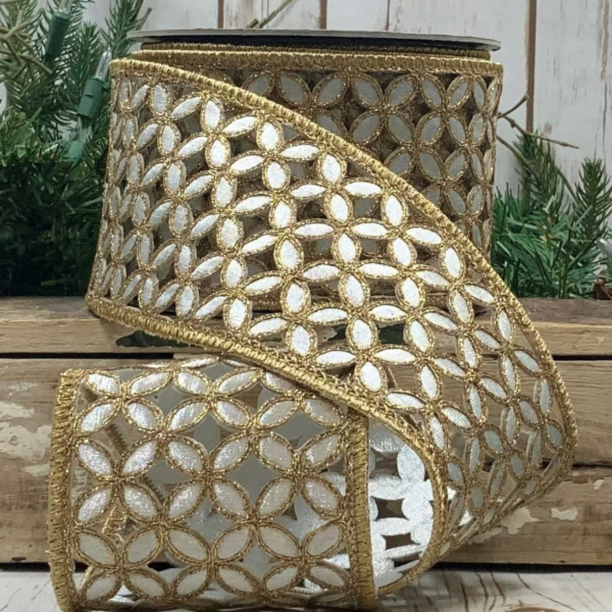 Four-inch wide metallic floral garland ribbon with a ten-yard length.