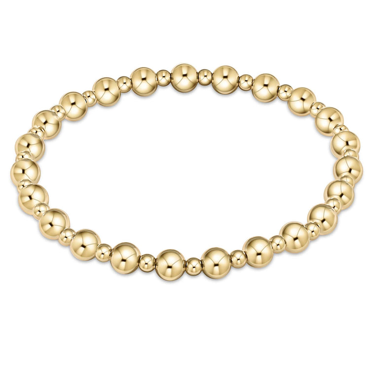 Gold-filled classic bracelet with alternating 5mm and 3mm beads on high-performance elastic.
