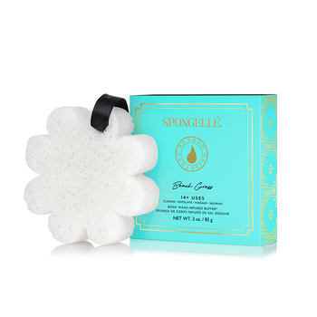 Boxed Flower bath sponge with built-in body wash, hanging ribbon handle, and creamy beige color.