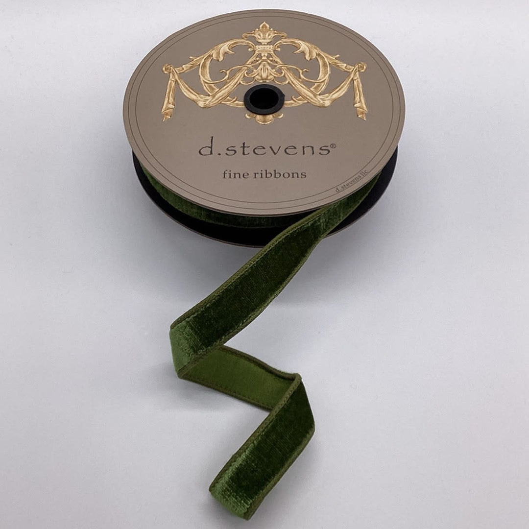 Spool of forest green velvet ribbon with a dupion back by d.stevens fine ribbons.
