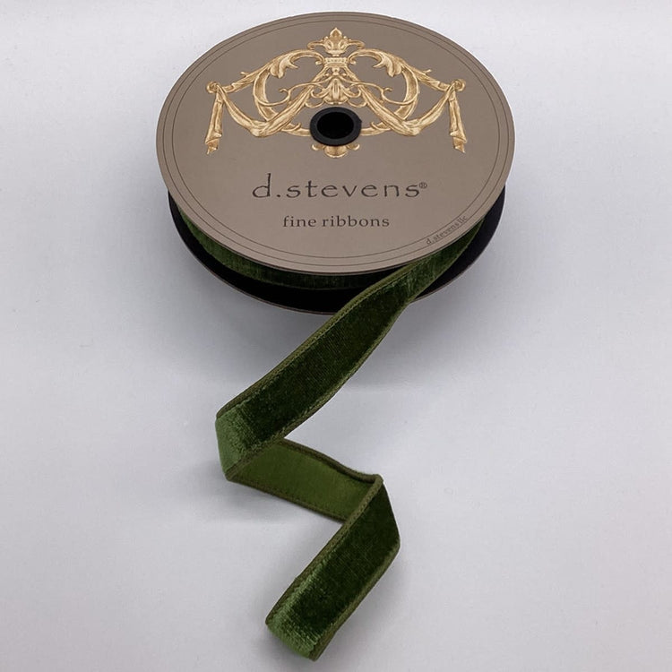 Spool of forest green velvet ribbon with a dupion back by d.stevens fine ribbons.