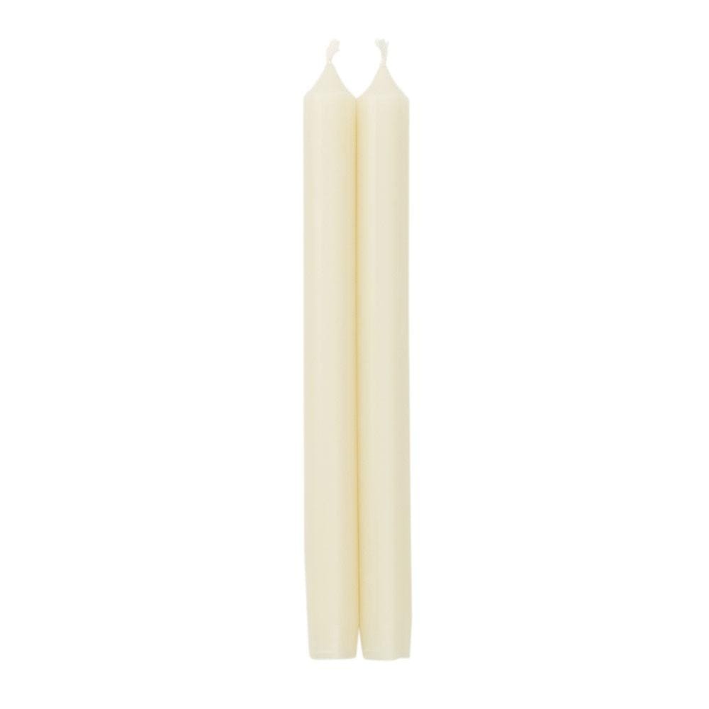 Ivory paraffin and palm wax crown candle with tapered bottom on a white background.