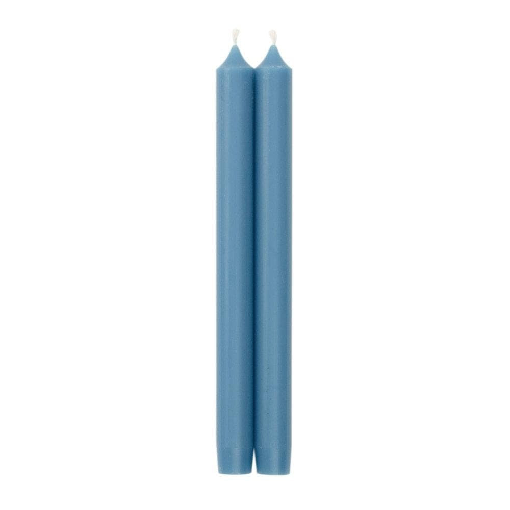Two Parisian blue paraffin and palm wax crown candles with tapered bottoms.