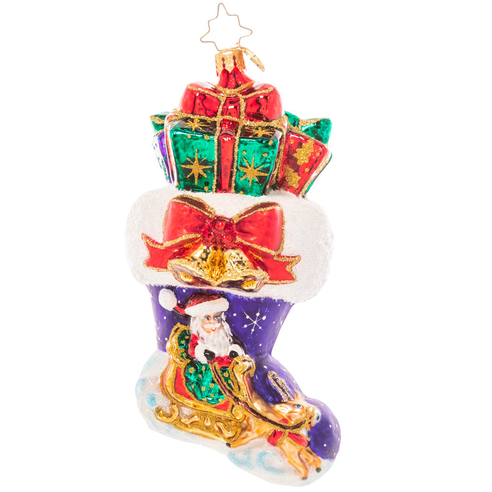 Overstuffed Christmas stocking ornament with snowy night scene featuring Santa's sleigh.