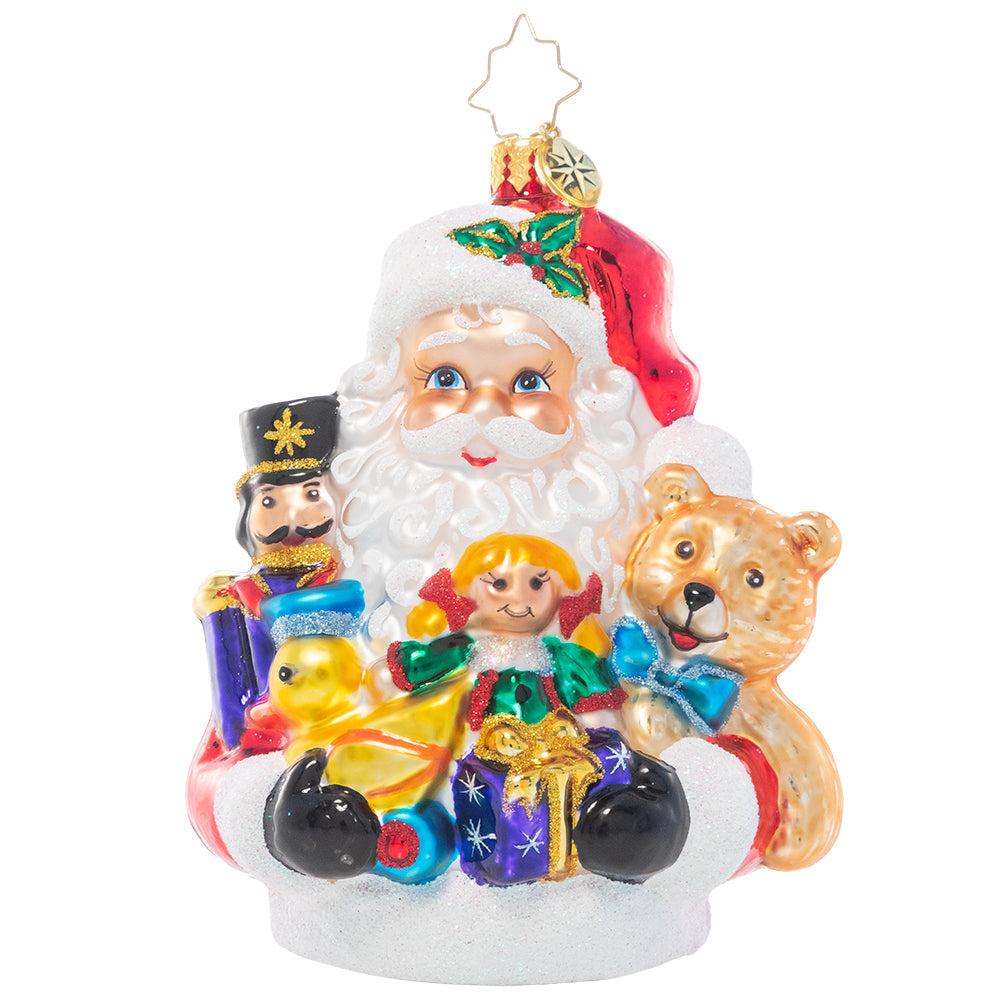 Red ceramic Santa figurine holding a sack of gifts with white beard.
