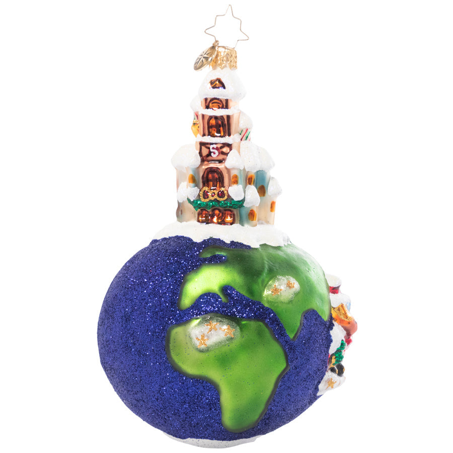 Plastic Santa Claus train figure in red suit with white beard riding a green locomotive.