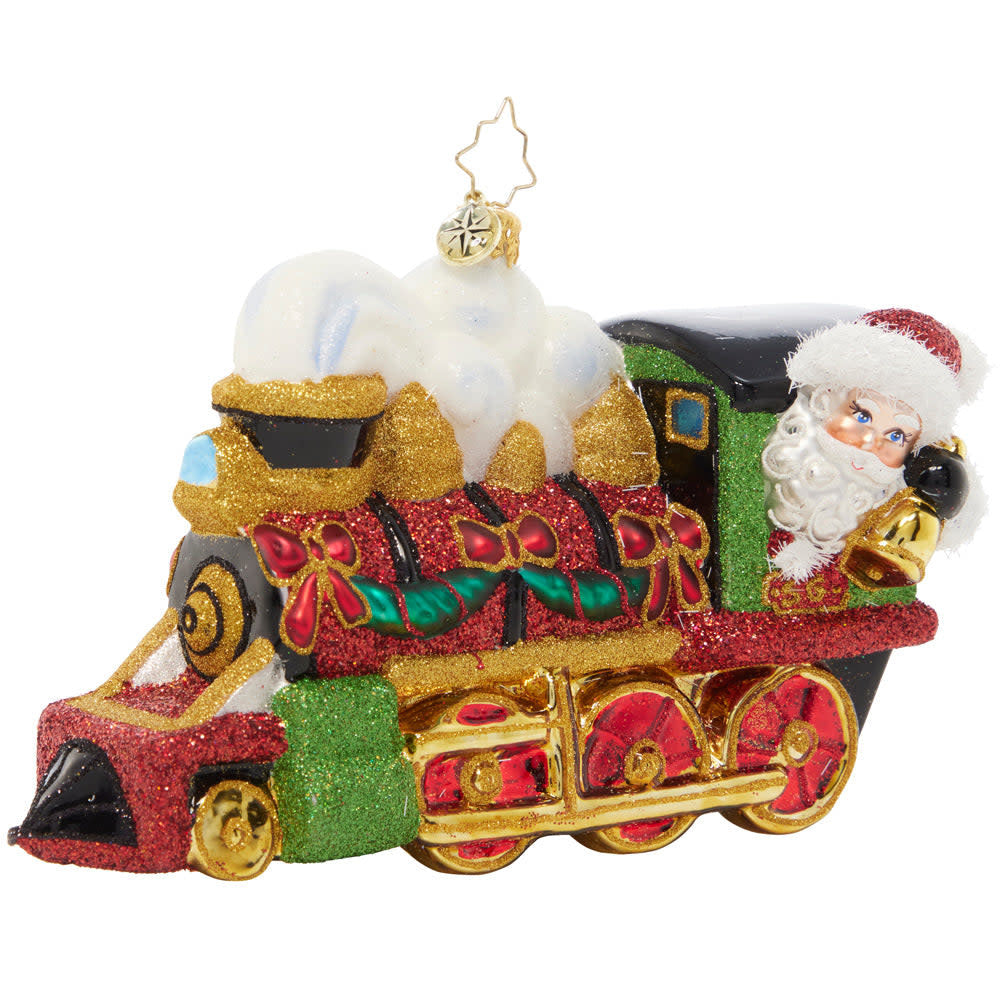Steaming Towards Christmas ceramic figurine showing Santa on a speeding train with steam effects.