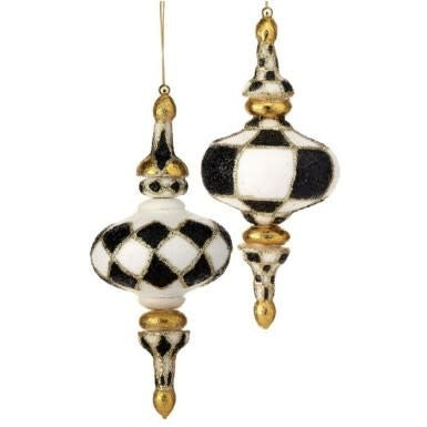 Two 10.5-inch harlequin ornaments with black and white diamond patterns and gold glitter accents.