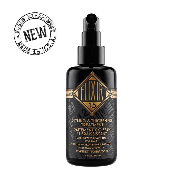 Bottle of Sweet Tobacco Elixir 13 leave-on hair treatment with dark vanilla and sweet tobacco scent.