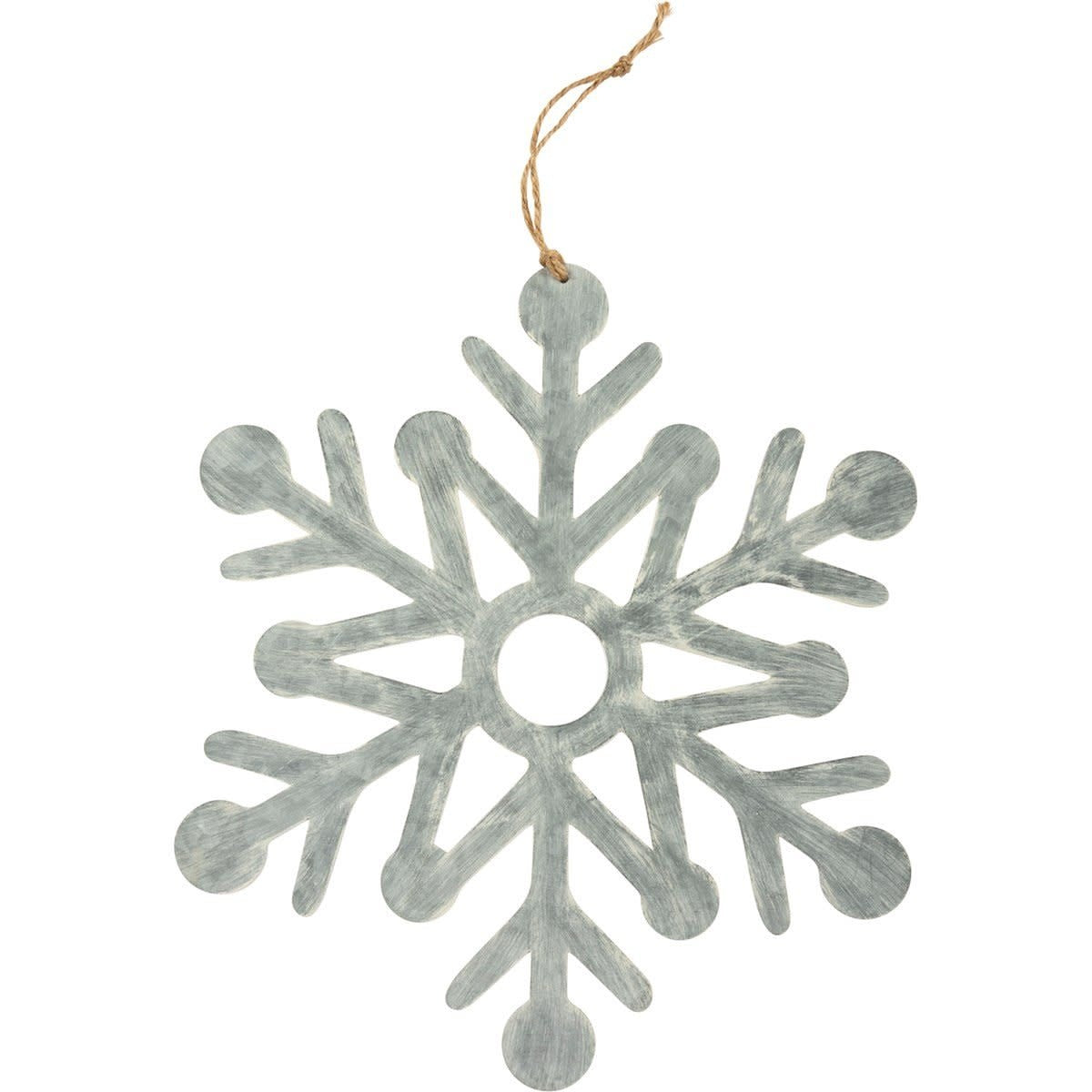 Metal snowflake hanging decor suspended from a jute string.