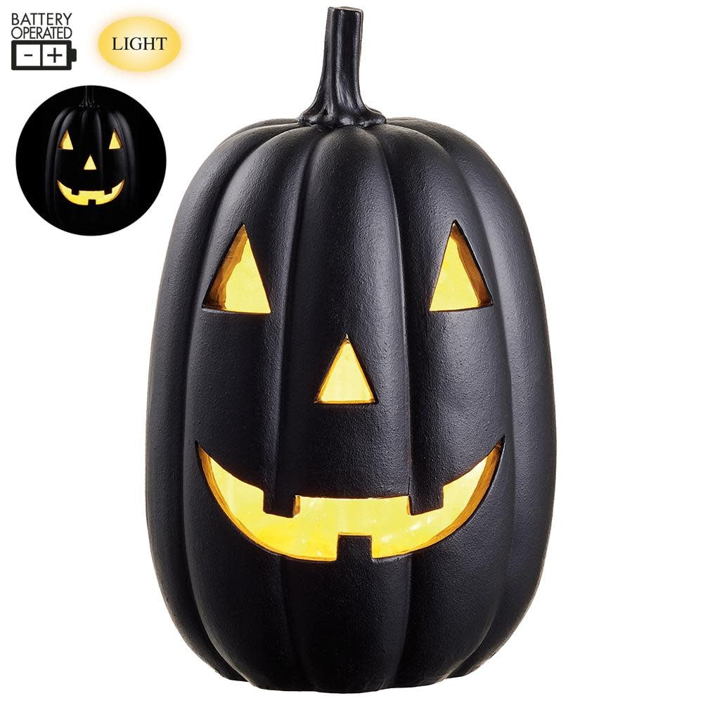 11-inch black resin jack-o'-lantern with a battery-operated light and classic carved face.