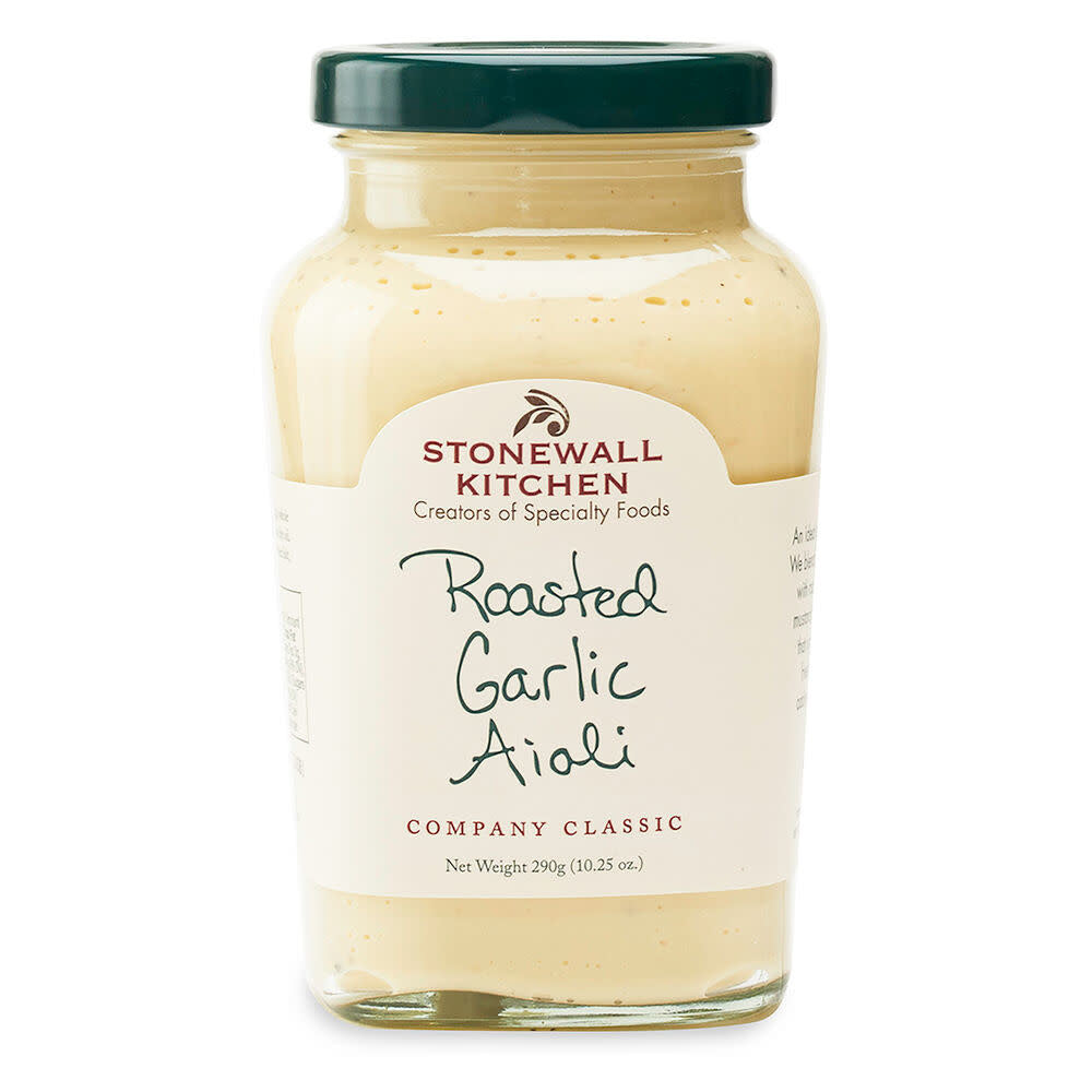 A 10.25oz glass jar of Stonewall Kitchen Roasted Garlic Aioli with a dark green lid.