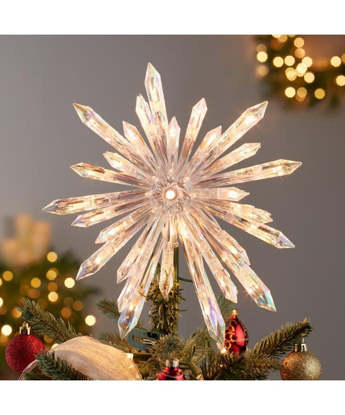 11.25-inch crystal-look snowflake Christmas tree topper with 30 clear incandescent lights.