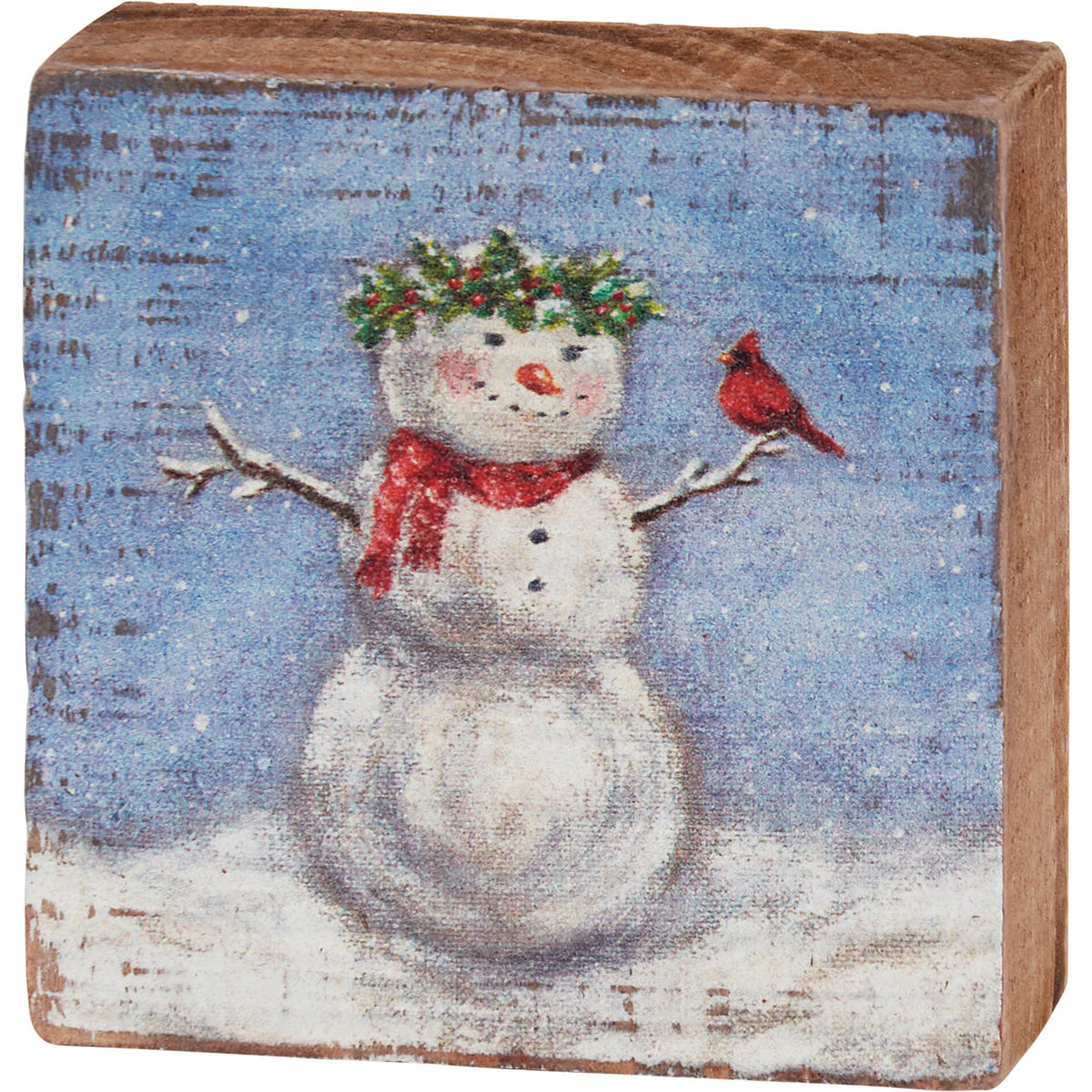 Red wooden block sign with white text reading Jesus Is The Reason For The Season.