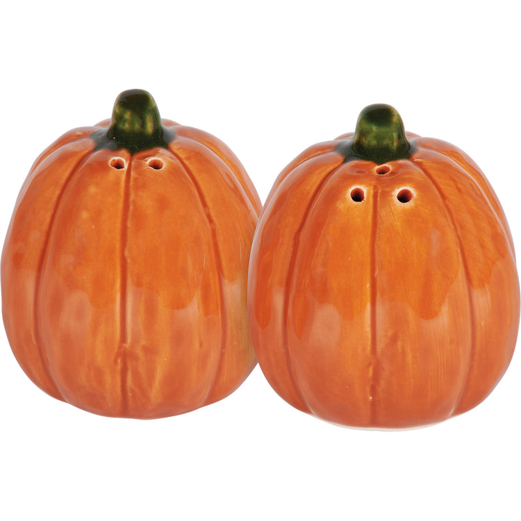 Stoneware salt and pepper shakers with orange pumpkin designs on green stems.