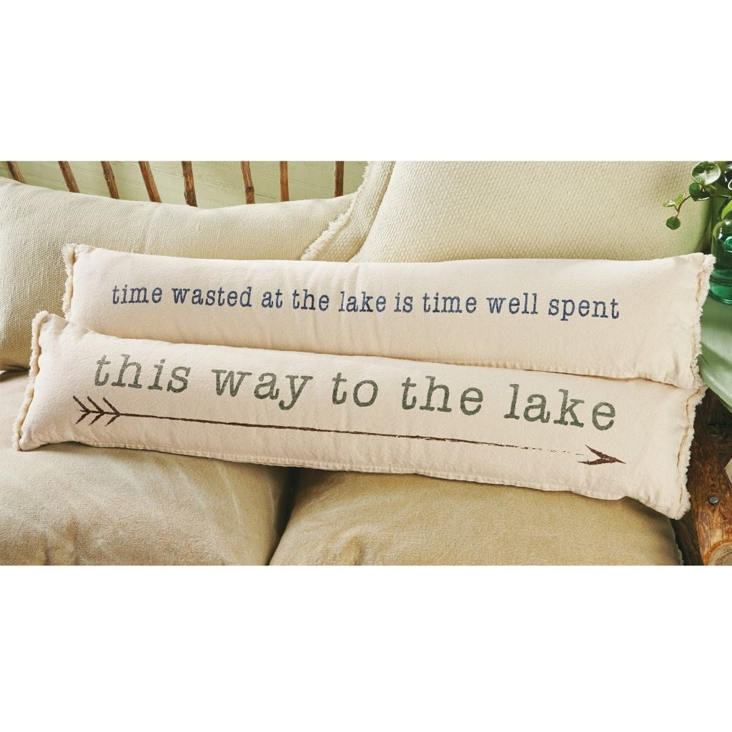 Long cotton Skinny Lake pillow with frayed ends displaying the Time Wasted sentiment print.