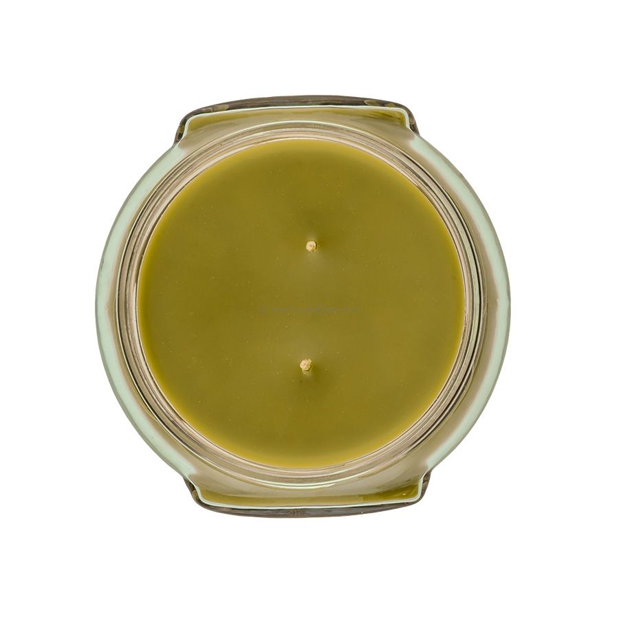 Top-down view of an 11oz Tyler candle in a glass jar with olive green wax and two wicks.