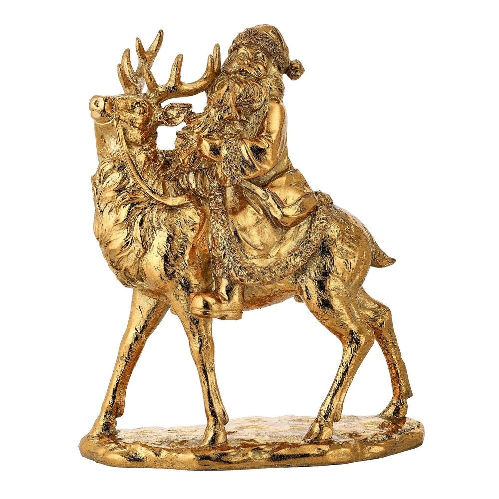 Gold-colored resin Santa Claus riding a deer figurine, 12 inches tall.