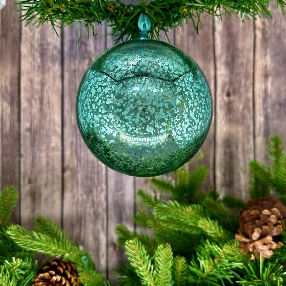 Hand-blown mercury glass ornament with vintage silver finish in a classic teardrop silhouette.