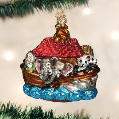 Noah's Ark ornament featuring a wooden-textured ark with animal figures on top.