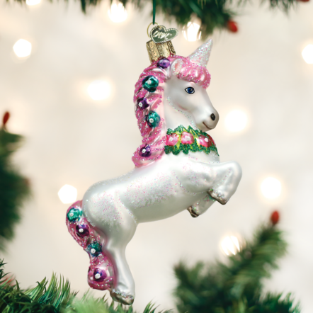 White ceramic unicorn ornament with spiral horn on forehead