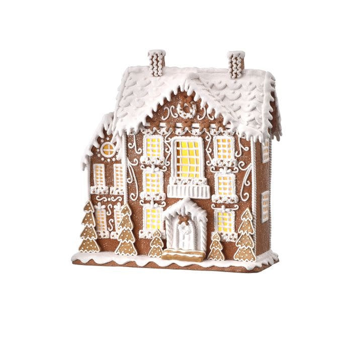 12.5-inch gingerbread-style colonial house with white icing details and warm LED interior lighting.