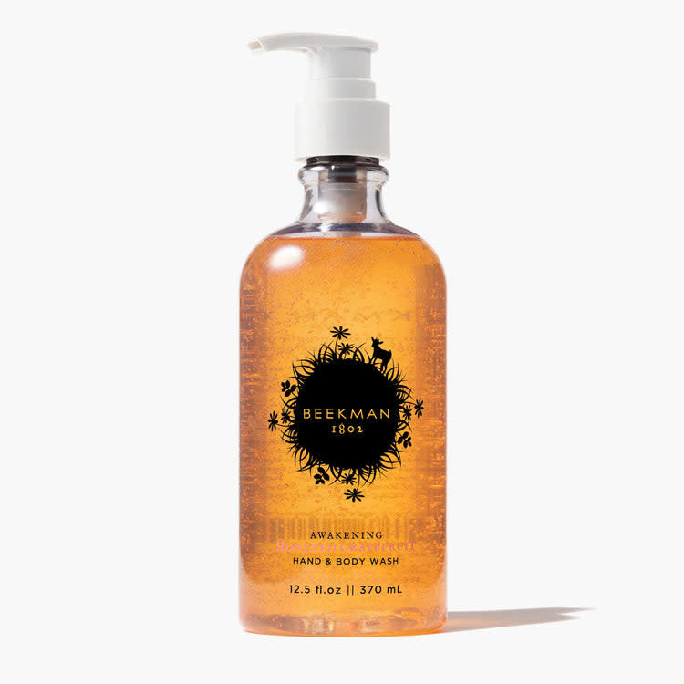 Beekman 1802 Honeyed Grapefruit hand and body wash in a clear 12.5 oz pump bottle.
