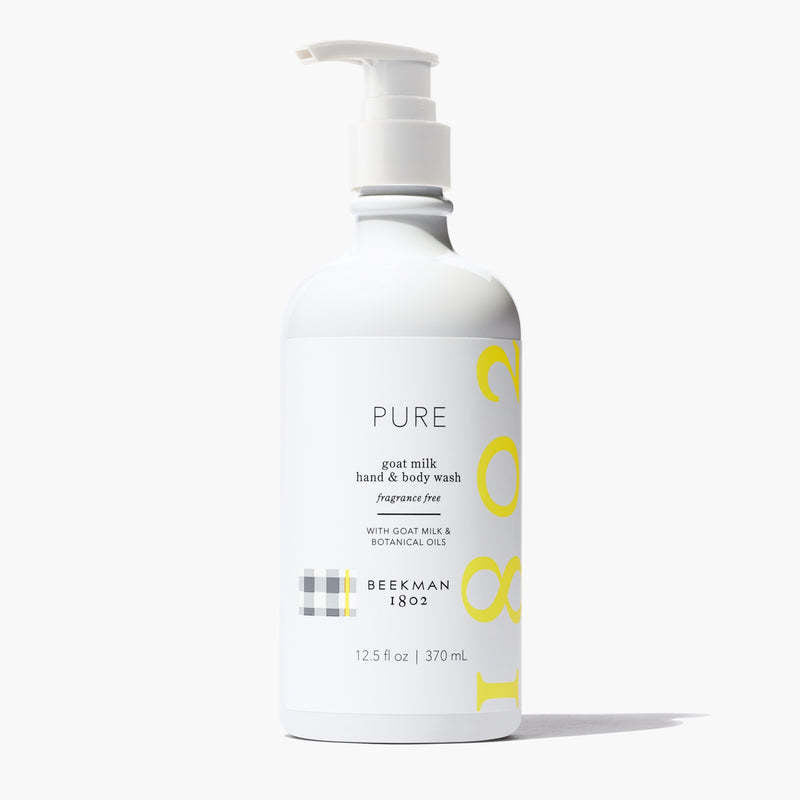 Beekman 1802 Pure goat milk hand and body wash in a white 12.5 fl oz pump bottle.