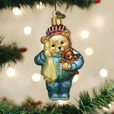 Bedtime Teddy Bear ornament with brown fur, wearing a blue blanket.