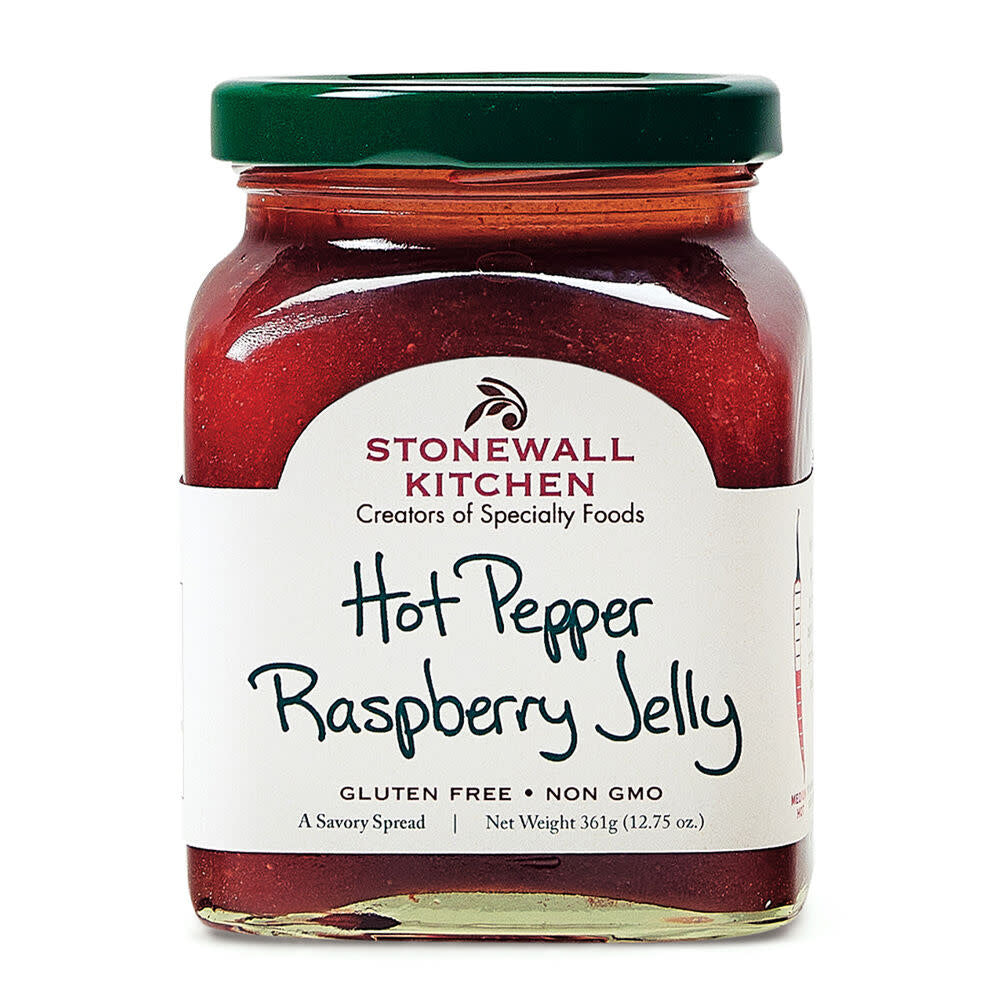 Stonewall Kitchen Hot Pepper Raspberry Jelly in a glass jar with a green lid.