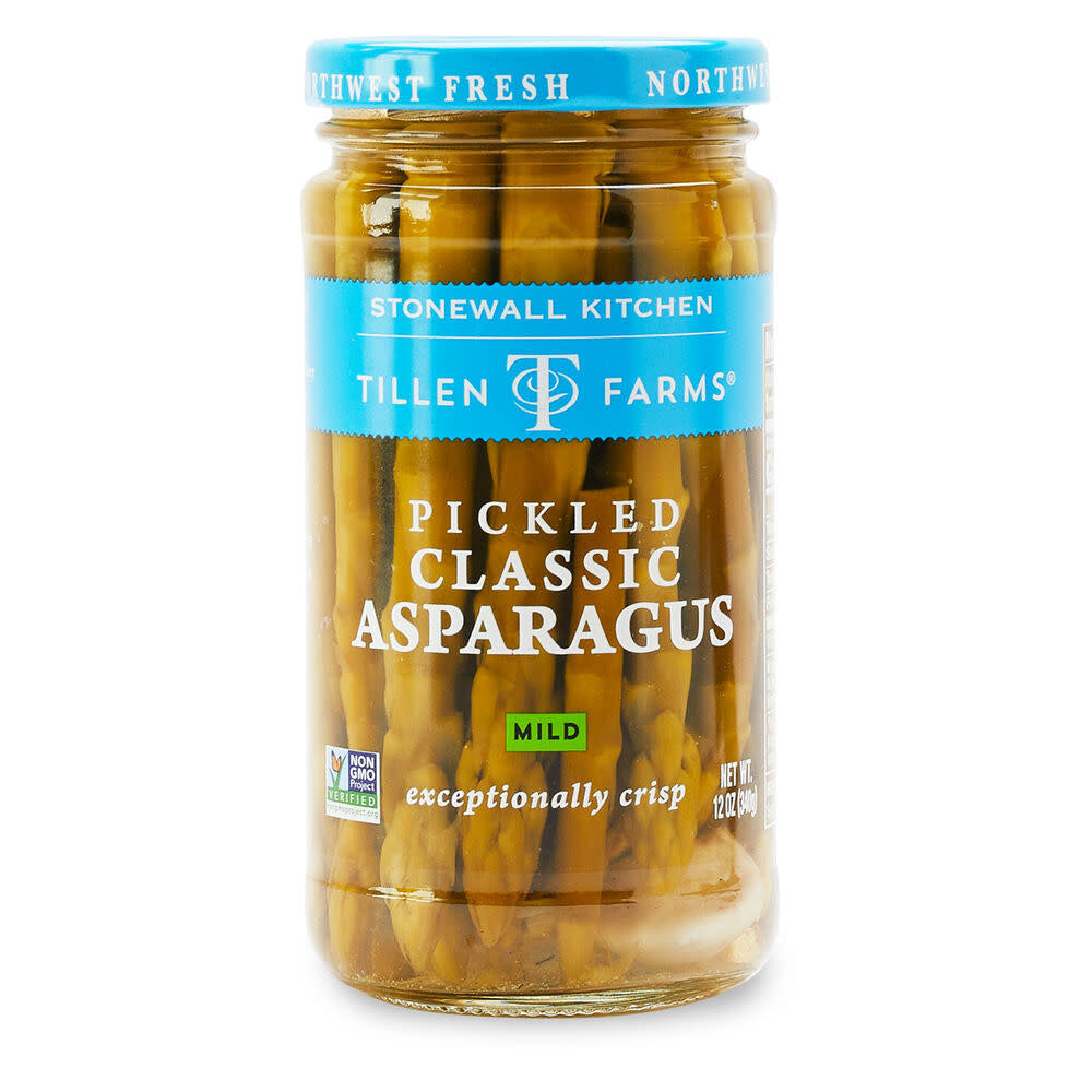 A jar of mild pickled asparagus spears in a clear brine.
