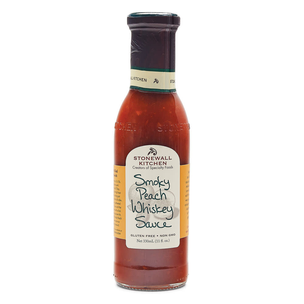 Bottle of Smoky Peach Whiskey Sauce with peach label
