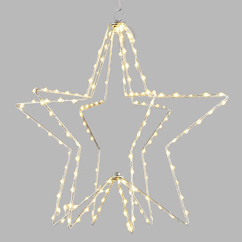 A knocked-down lighted star decoration made of iron, copper, and PVC with a silver frame featuring warm white LED lights.