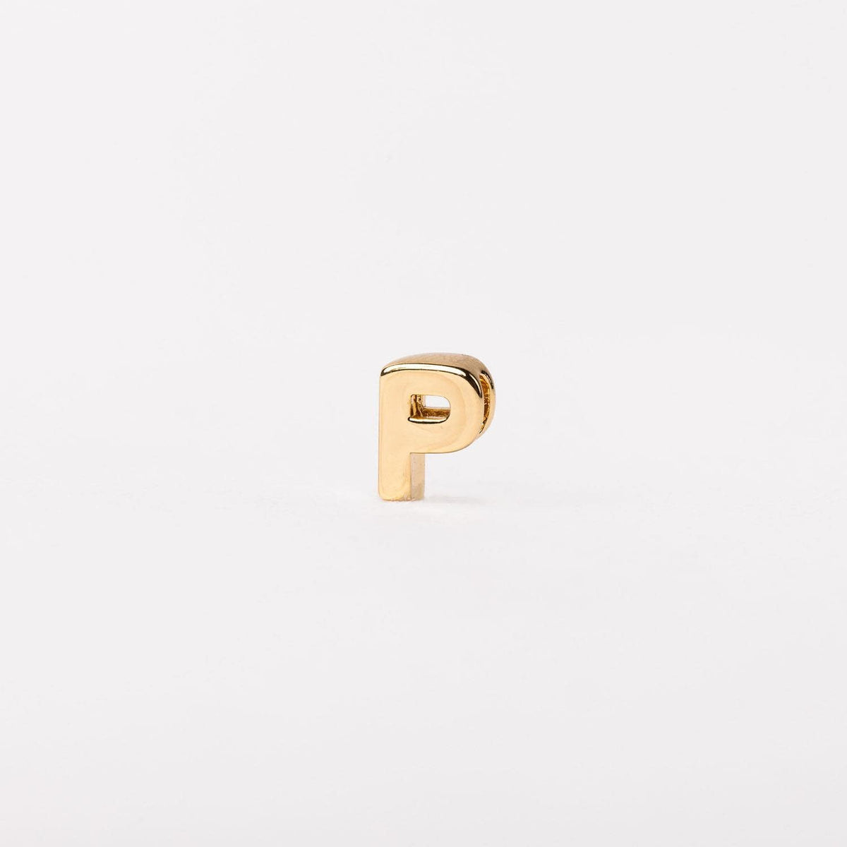 Gold-tone Charm Luxe bar necklace with a sleek rectangular pendant featuring subtle textured detailing.
