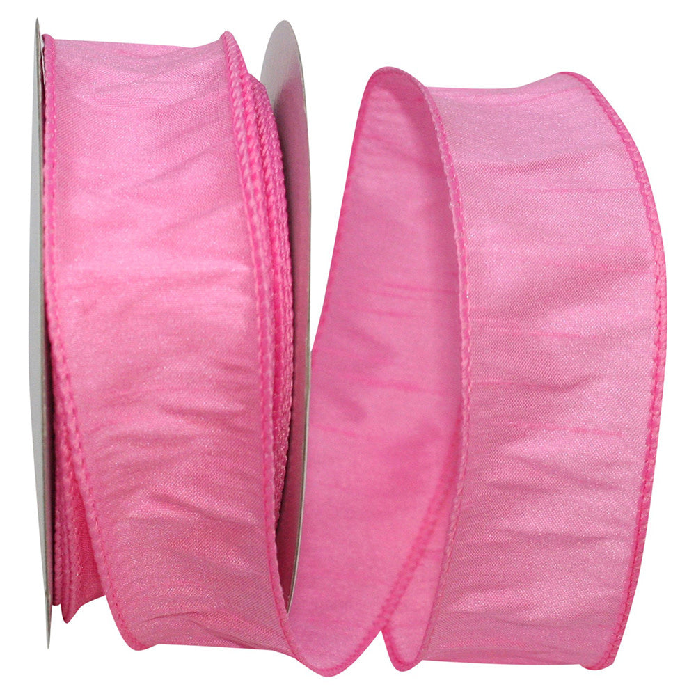 Pink 1.5-inch wide Dupioni ribbon with a textured finish and wired edges on a spool.