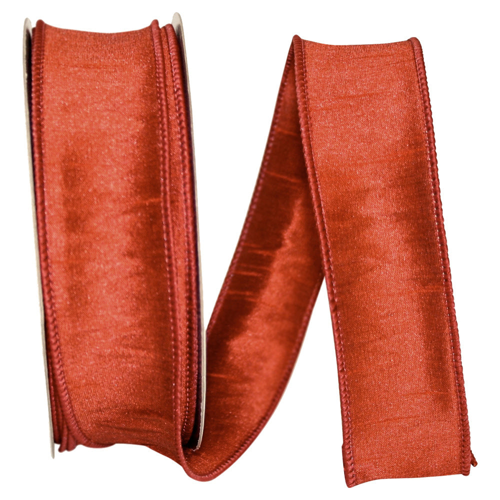 Rust-colored Dupioni wired edge ribbon with a textured finish.