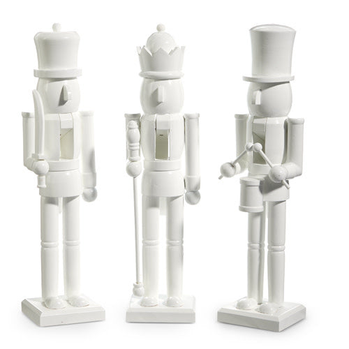 White wooden nutcracker standing figure with classic soldier silhouette measuring 15 inches tall.