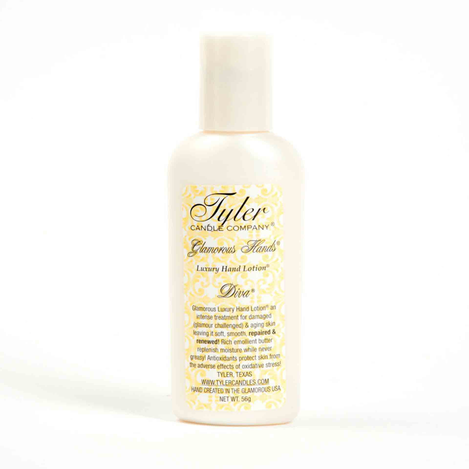Luxury hand lotion bottle with a fresh fruit floral chocolate amber scent.
