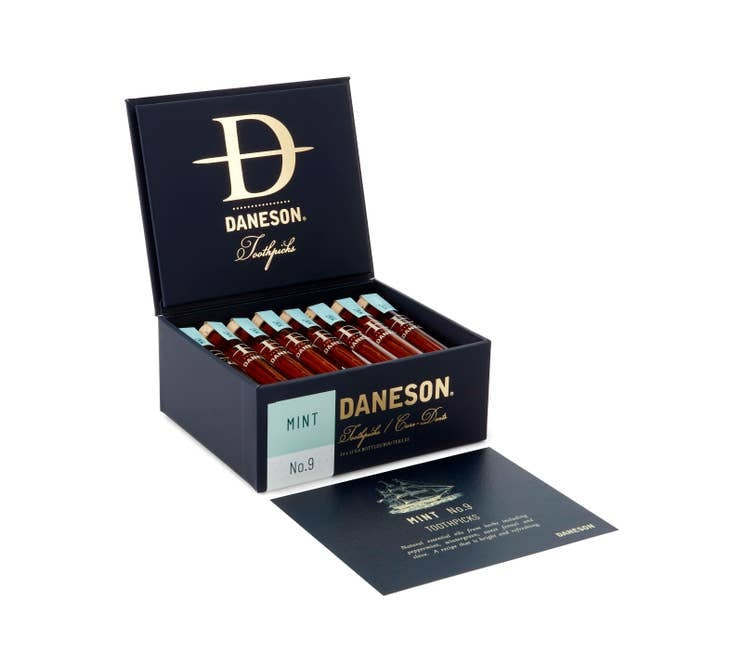 Packaging for Scotch-aged birch toothpicks with white oak barrel notes.