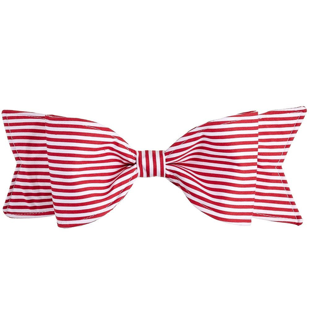 Red and white striped fabric bow with metal clip attachment