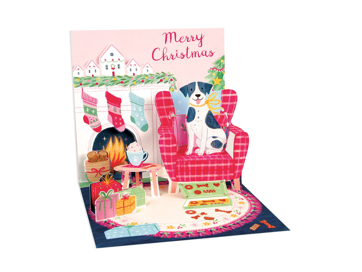 Silly Dogs Christmas pop-up card with dog in armchair beside fireplace