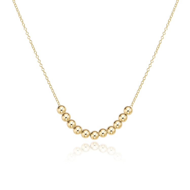 Classic gold-filled necklace with a clarity charm on an 16-inch chain.