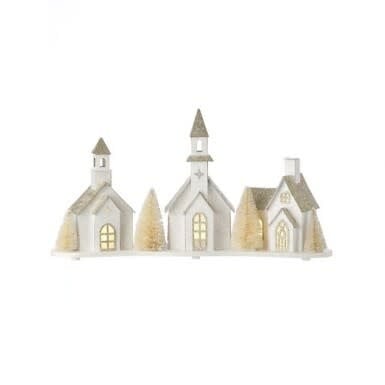 Cardboard snowy village scene with church featuring LED lights on a 16-inch tabletop display