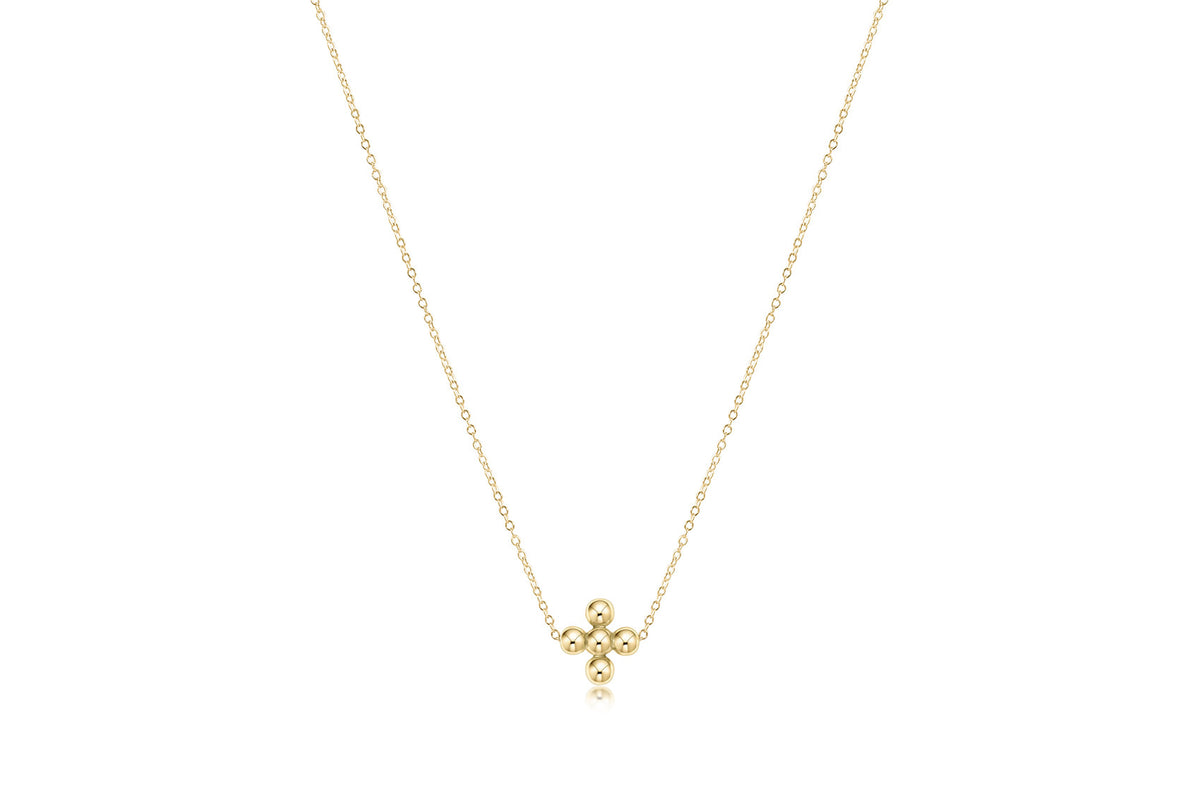 Gold beaded necklace featuring a classic signature cross pendant with 4mm beads.